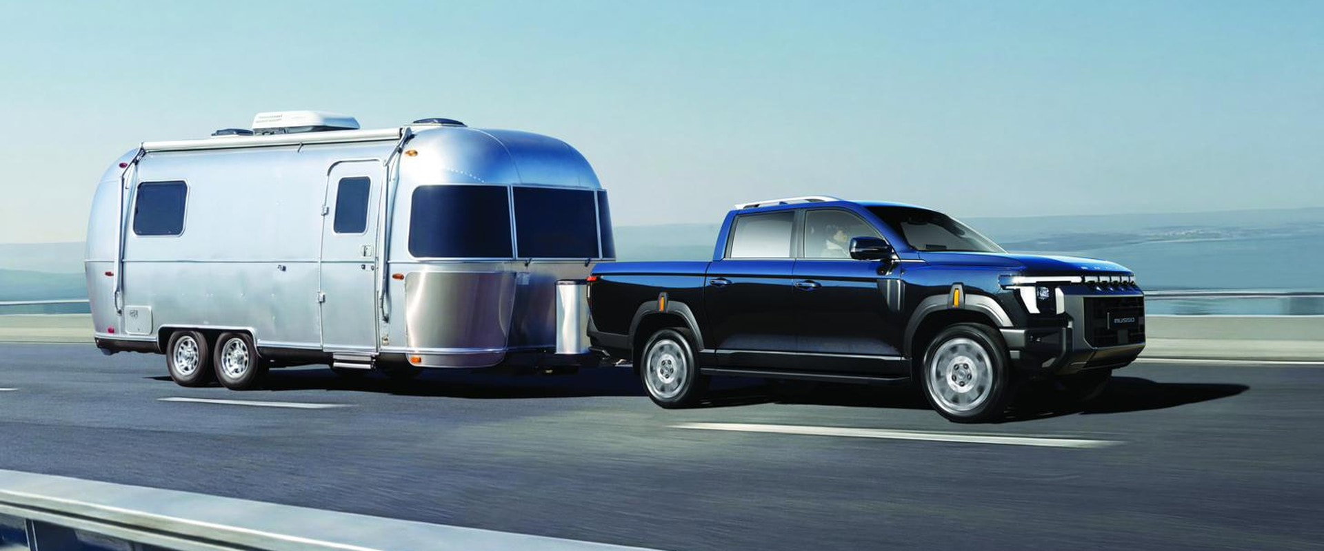Musso Rhino towing a trailer