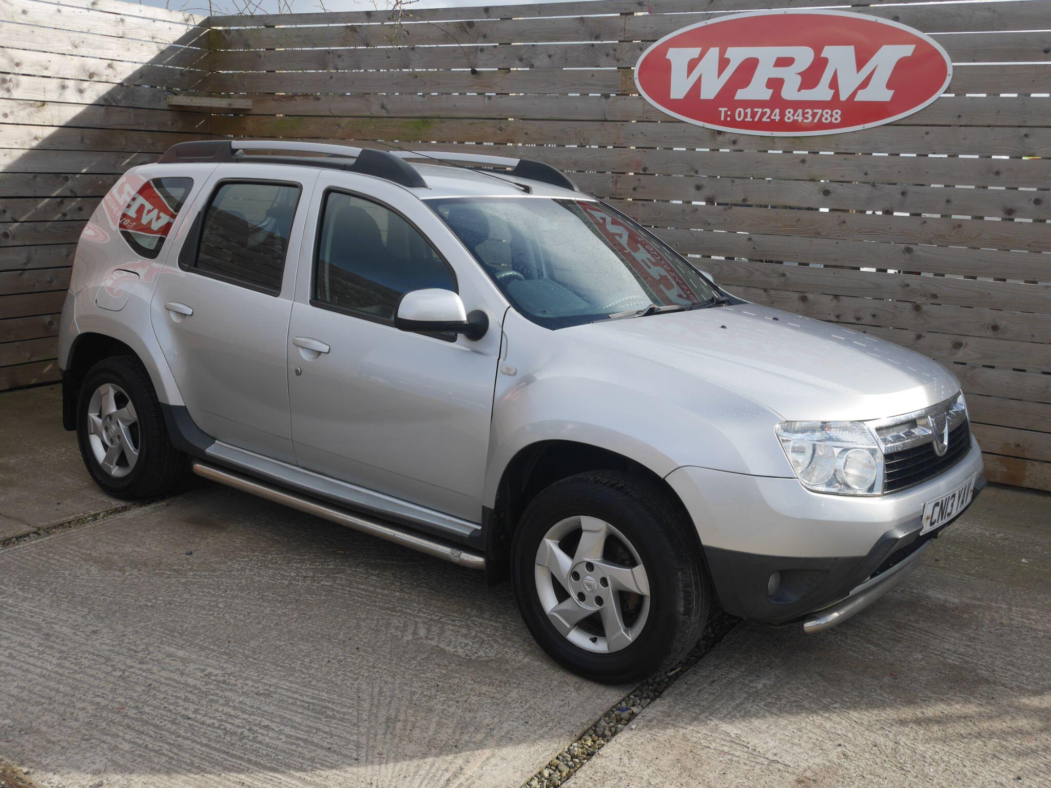 2013 Dacia Duster 1.5 dCi Laureate SUV 5dr Diesel Manual 4WD Euro 5 (110 ps), exterior view 3