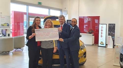 Opus Motor Group has raised almost £20,000 for Teenage Cancer Trust