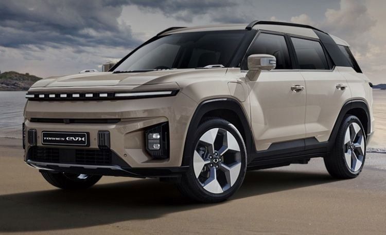 KGM Torres EVX electric SUV in a scenic setting