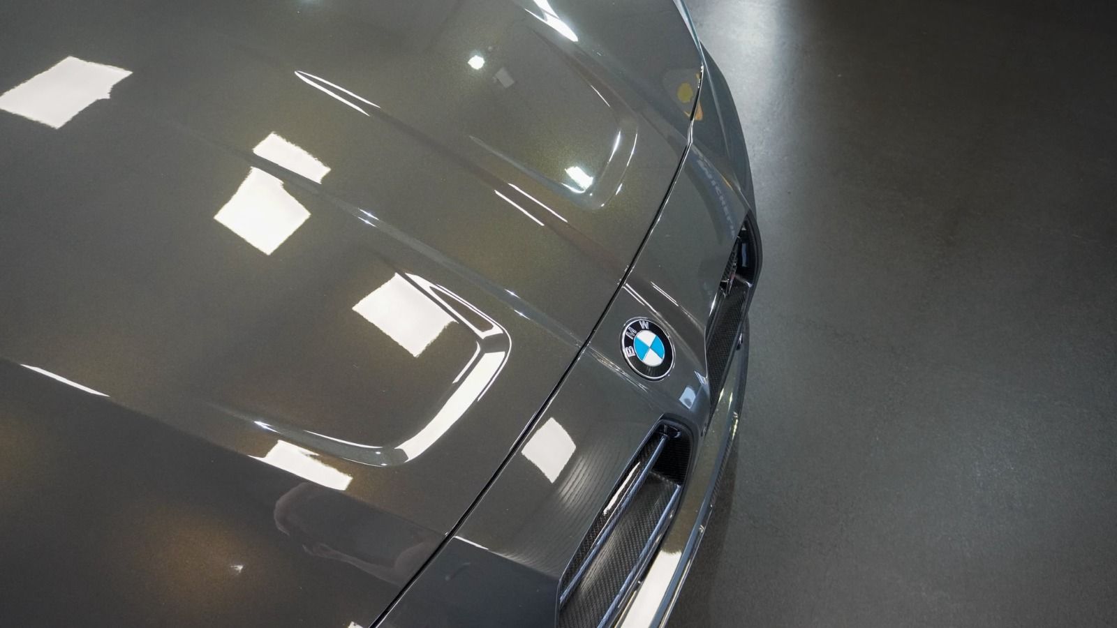 Close-up of a flawless, freshly corrected paint finish